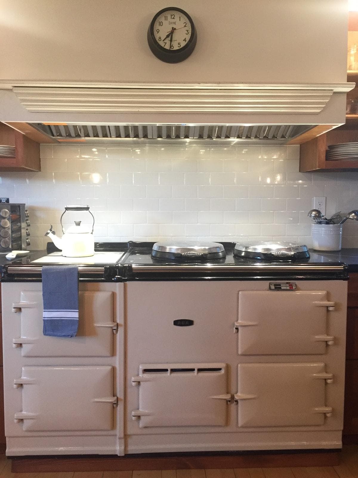 The British AGA has 4 ovens, 2 burners, a warming plate, and is on at all times (it gives off a gentle heat).