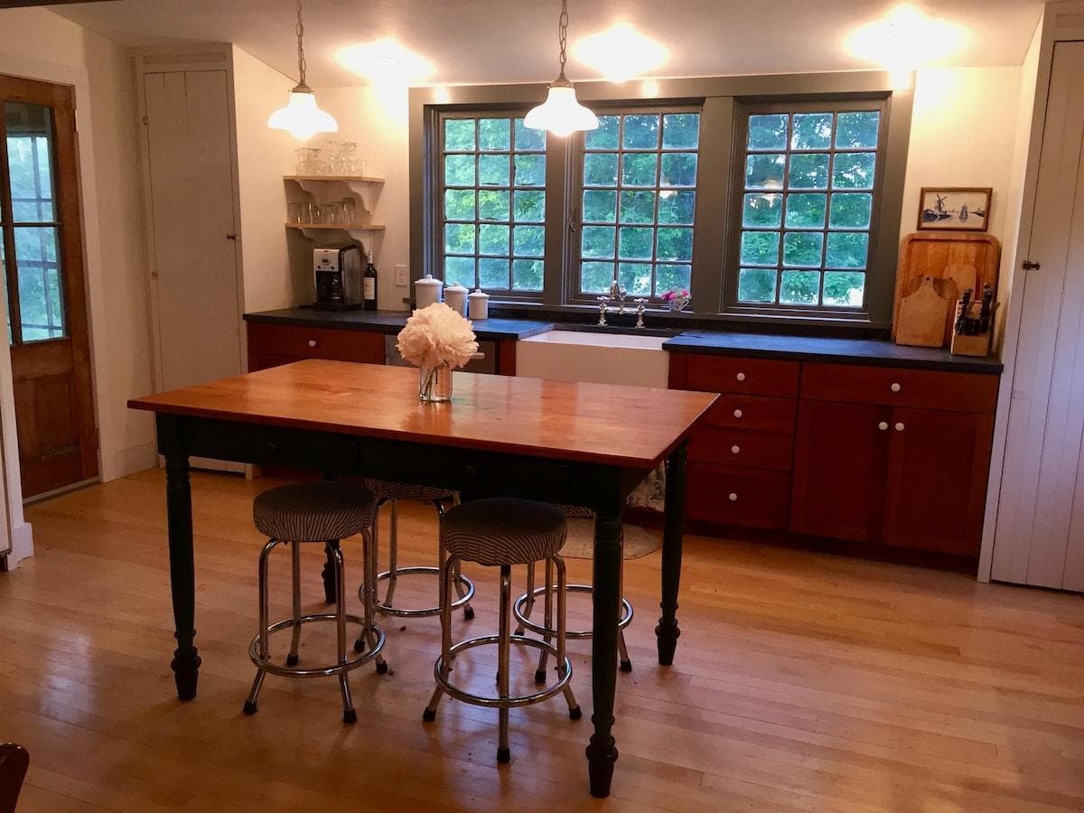 Kitchen window looks out onto the backyard and over the neighboring hay field.